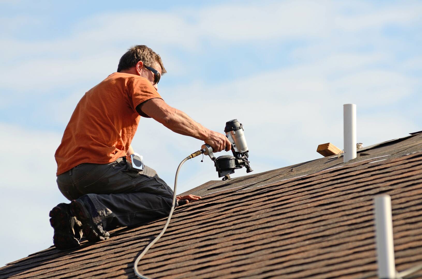 Loyalty Roofing & Construction logo