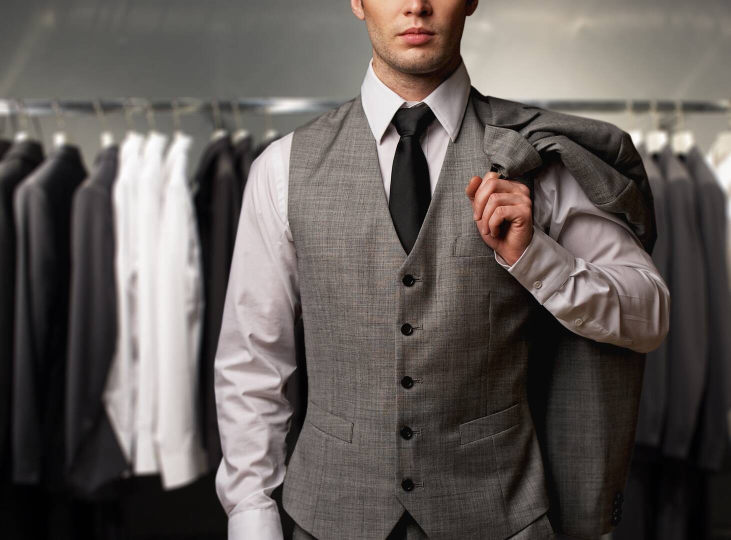 Ted's Clothiers logo